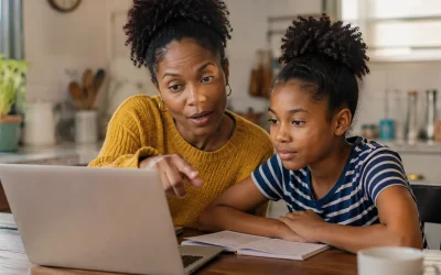 parent and child learning how to teach kids AI at home together on a laptop